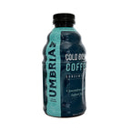 a 32oz bottle of caffe umbria cold brew concentrate with blue wrap with umbria logo