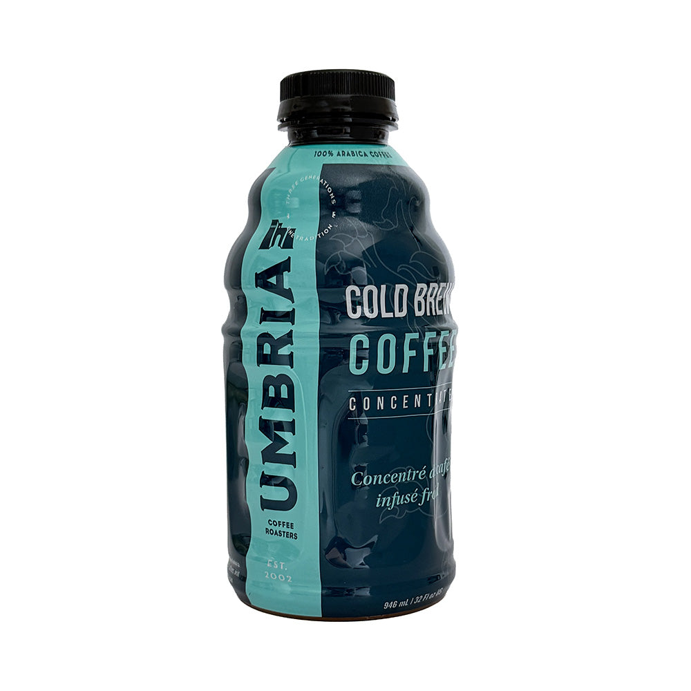 a 32oz bottle of caffe umbria cold brew concentrate with blue wrap with umbria logo