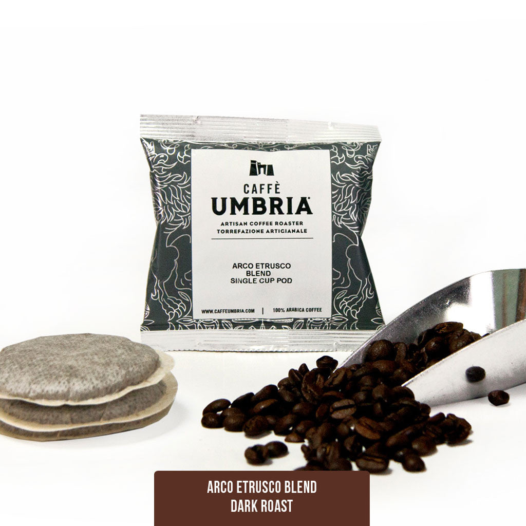 coffee pods, coffee scoop and coffee beans with pod pouch
