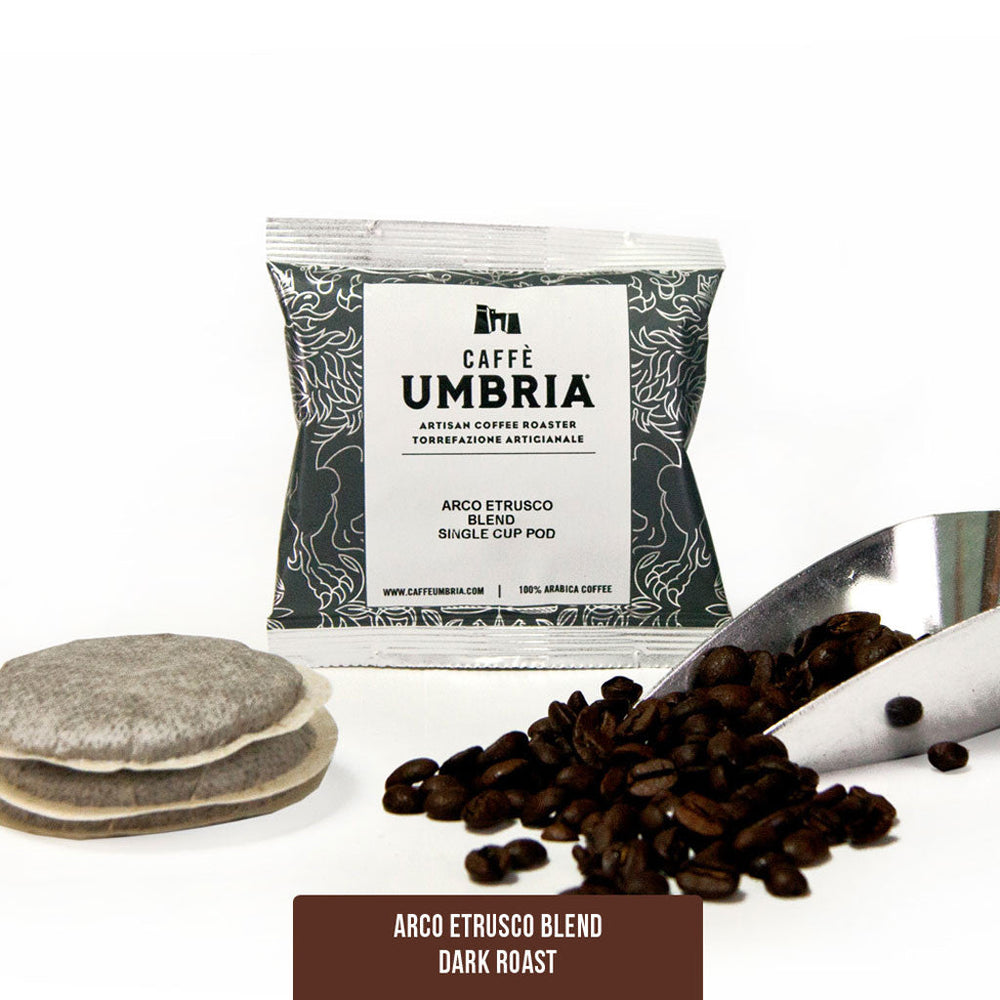 coffee pods, coffee scoop and coffee beans with pod pouch